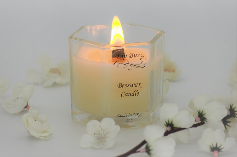Burning beeswax candle